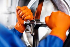 Nitrilhandschoenen GoGrip oranje maat M, 50 stuks